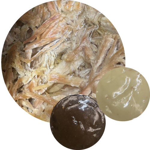 Pulled pork with insets of beef gravy and chicken gravy.