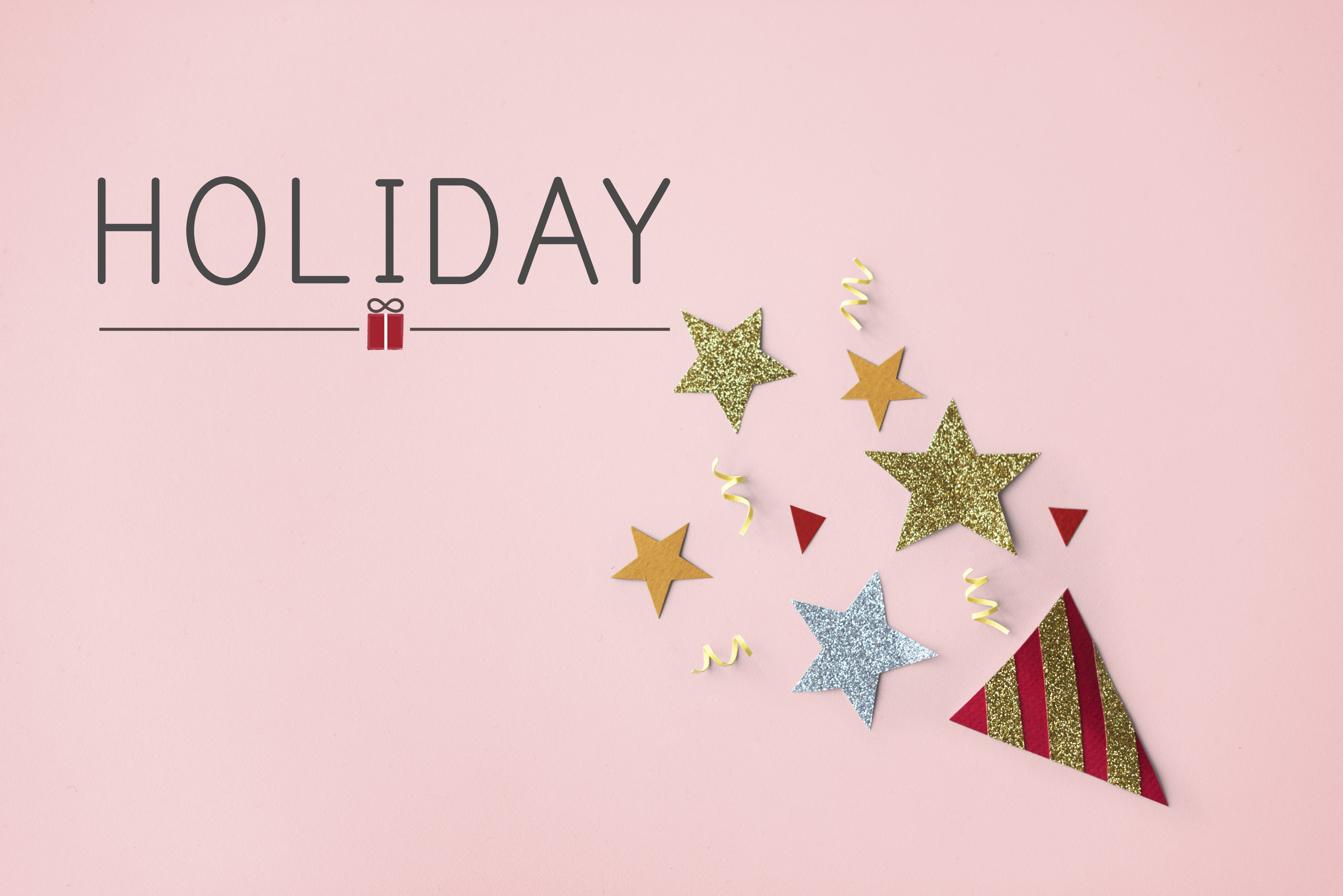 Pink background Holiday image with hat and stars.